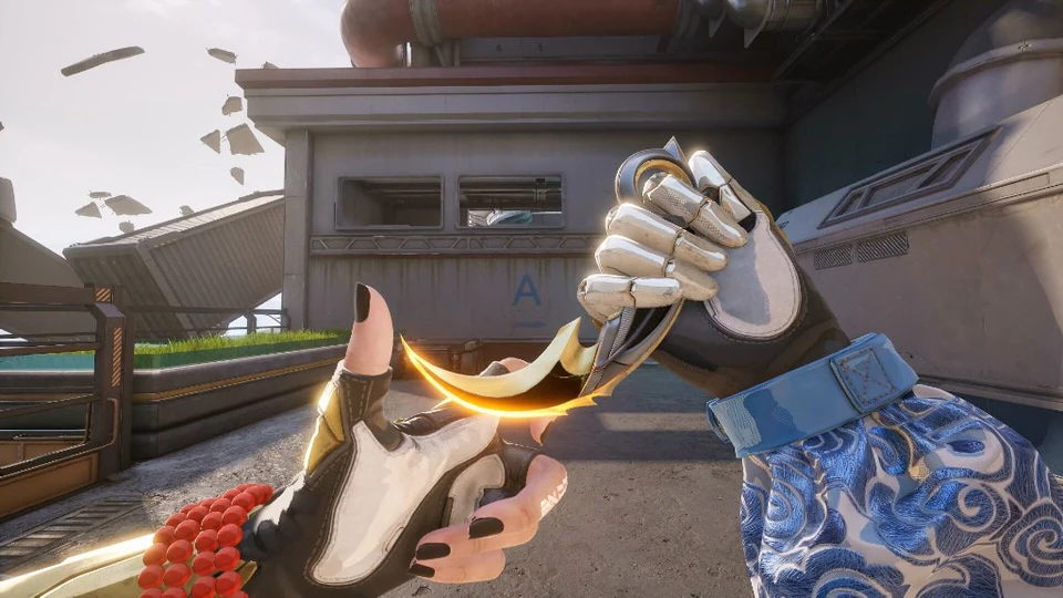 FragPunk first-person view of a glowing melee knife and tactical gloves